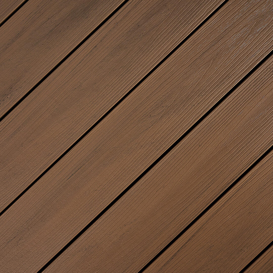 Blick von oben auf eine Dielenfläche im natürlichen Holzlook und der Farbe Muskat.